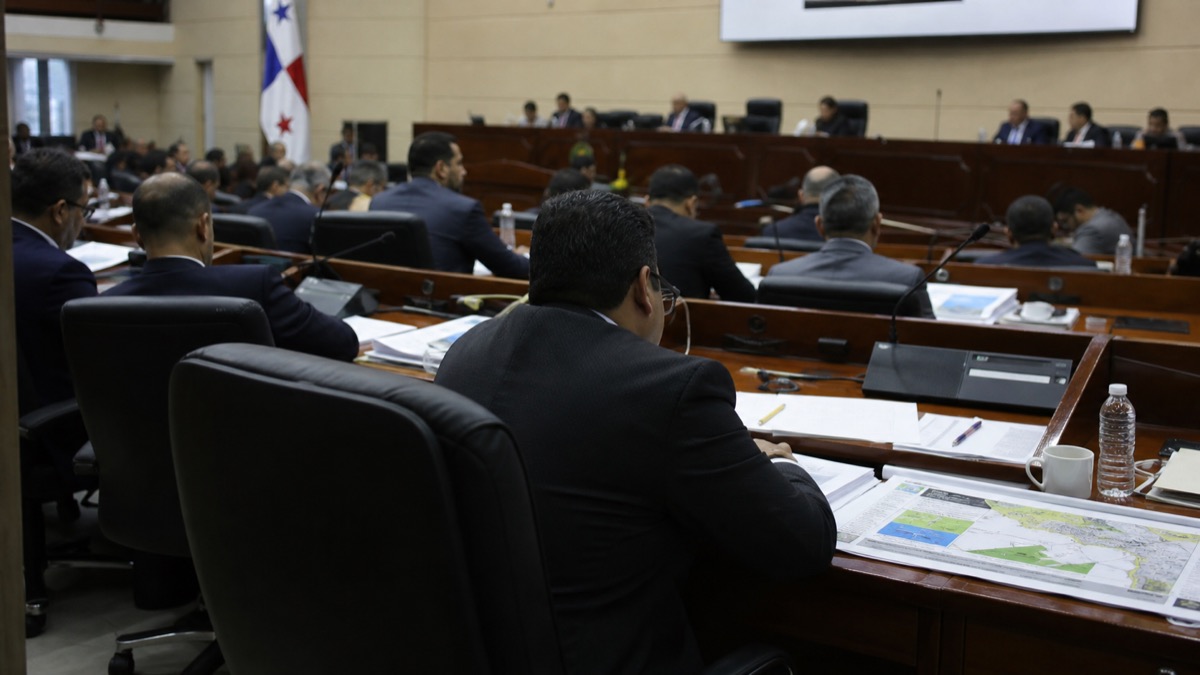 formal legislative budget hearing room with environmental documents