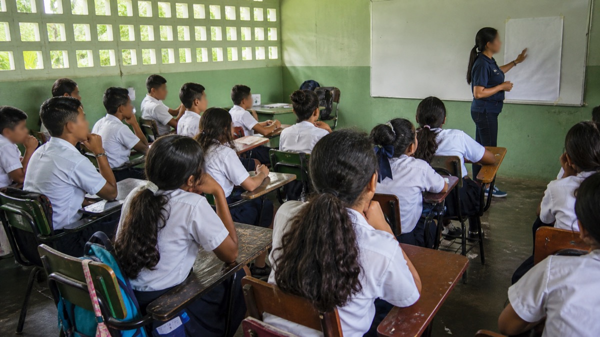 middle school students in a Veraguas classroom participating in a leadership workshop, faces not identifiable