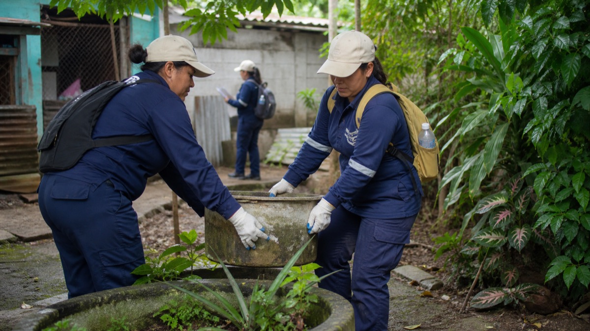 public health workers removing standing water containers during a dengue prevention operation in Chiriqui Panama