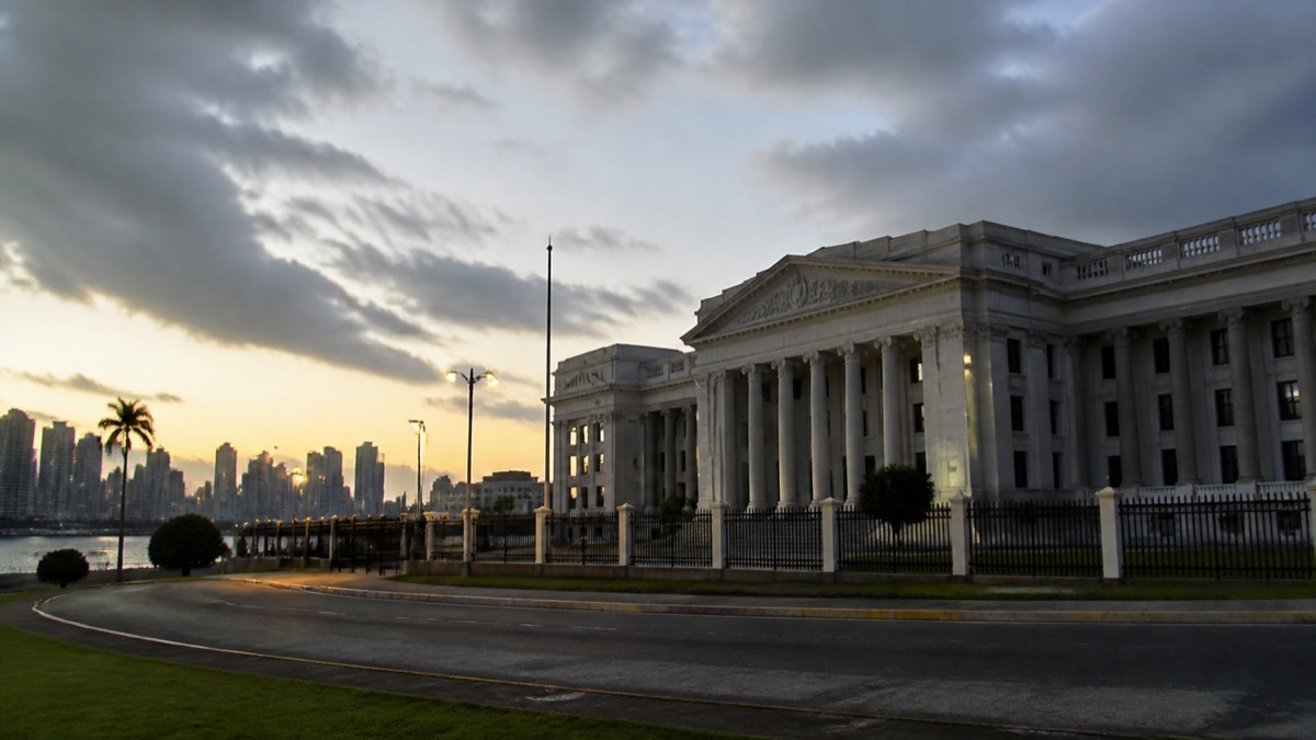 somber exterior of a civic institution at dusk with lowered light