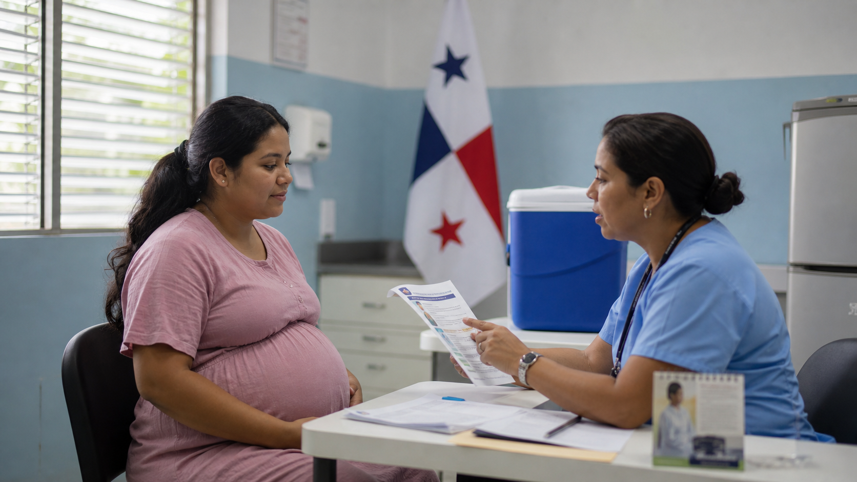 A clinician discusses preventive care with a pregnant woman in a public health clinic
