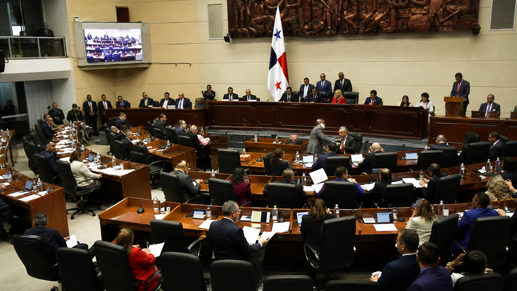 A legislative chamber setting prepared for debate over representation reform.